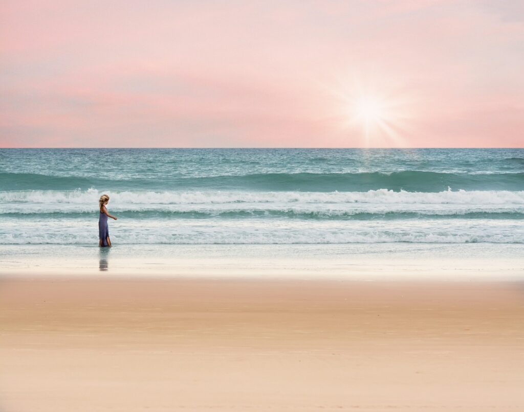 girl walking on the beach